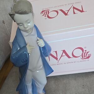 Nao by Lladro Boy Figurine in Blue Coat